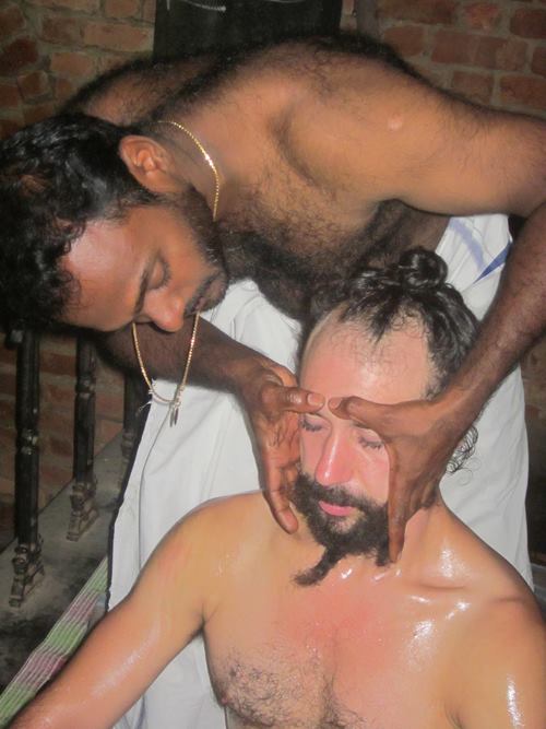 Traditional Marma therapy head and neck treatment session using authentic Kerala Ayurvedic oil massage techniques for healing and wellness